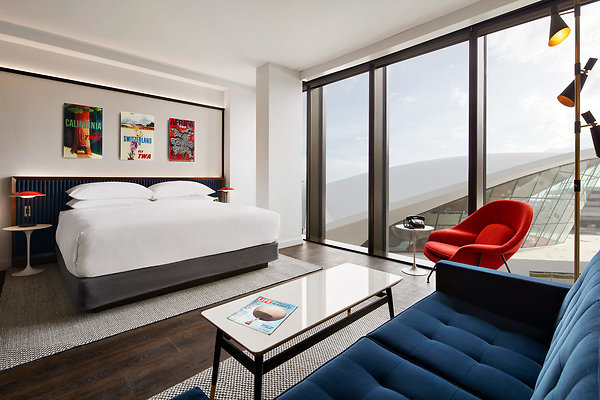 TWA-Hotel Executive-King-Suite-with-Historic-TWA-View-1-scaled